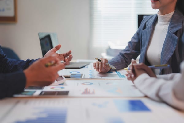 business-people-discussing-and-analyzing-financial-2026-01-09-10-41-35-utc-2